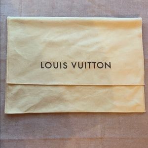 Louis Vuitton small dust bag.